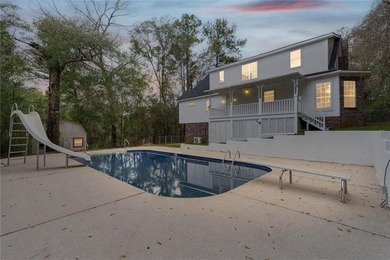 Welcome to this beautifully updated 4 bed, 3 bath home in the on Lake Forest Yacht and Country Club in Alabama - for sale on GolfHomes.com, golf home, golf lot