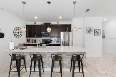 This stunning two-story Townhome is perfect for anyone searching on National Golf Course in Florida - for sale on GolfHomes.com, golf home, golf lot