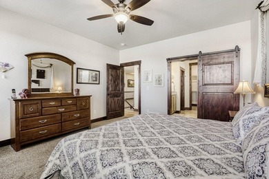 Experience refined Colorado living in this stunning Hudson model on Raindance National Golf Course in Colorado - for sale on GolfHomes.com, golf home, golf lot