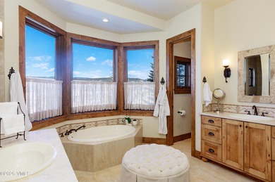 Simply put, this is the pinnacle of Eagle Ranch living. Set on on Eagle Ranch in Colorado - for sale on GolfHomes.com, golf home, golf lot