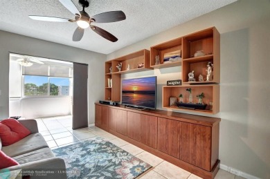 RENOVATED CORNER IN ASHBY; LOTS OF LIGHT! IMPACT WINDOWS on Hillsboro Pines Golf in Florida - for sale on GolfHomes.com, golf home, golf lot