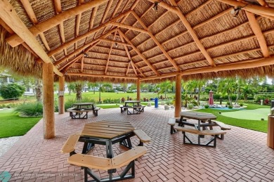 RENOVATED CORNER IN ASHBY; LOTS OF LIGHT! IMPACT WINDOWS on Hillsboro Pines Golf in Florida - for sale on GolfHomes.com, golf home, golf lot