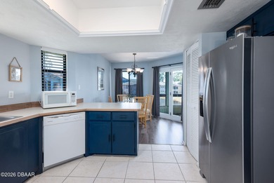 BEAUTIFUL WATER VIEWS! MAINTEANCE FREE LIVING! RACE FANS on The Club At Pelican Bay - North Course in Florida - for sale on GolfHomes.com, golf home, golf lot