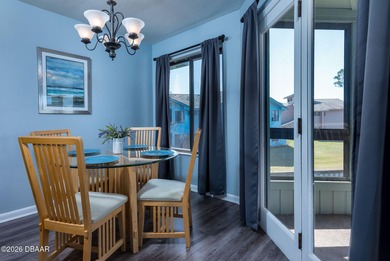 BEAUTIFUL WATER VIEWS! MAINTEANCE FREE LIVING! RACE FANS on The Club At Pelican Bay - North Course in Florida - for sale on GolfHomes.com, golf home, golf lot