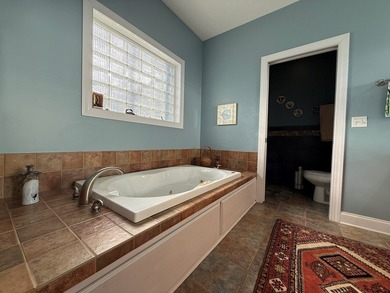 Situated on Chatham Lake, this custom built 4 bedroom/2.5 bath on Glade Springs Resort Golf Course in West Virginia - for sale on GolfHomes.com, golf home, golf lot