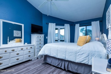 BEAUTIFUL WATER VIEWS! MAINTEANCE FREE LIVING! RACE FANS on The Club At Pelican Bay - North Course in Florida - for sale on GolfHomes.com, golf home, golf lot