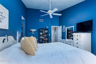 BEAUTIFUL WATER VIEWS! MAINTEANCE FREE LIVING! RACE FANS on The Club At Pelican Bay - North Course in Florida - for sale on GolfHomes.com, golf home, golf lot