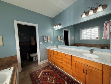 Situated on Chatham Lake, this custom built 4 bedroom/2.5 bath on Glade Springs Resort Golf Course in West Virginia - for sale on GolfHomes.com, golf home, golf lot