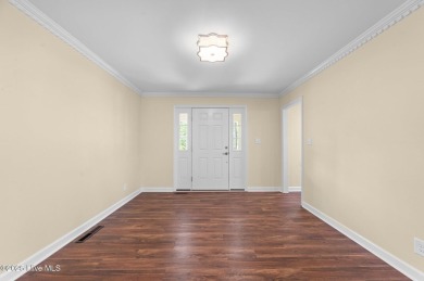Spacious home, that has been meticulously maintained , located on Washington Yacht and Country Club in North Carolina - for sale on GolfHomes.com, golf home, golf lot