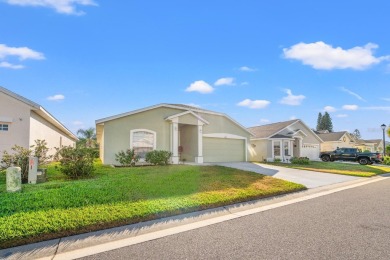 Welcome Home! NEW ROOF! This charming 2-bedroom, 2-bathroom home on Ridgewood Lakes Golf and Country Club in Florida - for sale on GolfHomes.com, golf home, golf lot