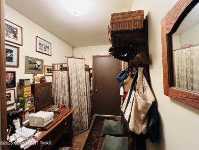 Welcome to this cozy 2-bedroom, 1-bath ranch home nestled in the on Pocono Farms Country Club in Pennsylvania - for sale on GolfHomes.com, golf home, golf lot