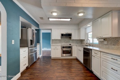 WOW FACTOR is on prominent display throughout this fantastic on Daytona Beach Golf Club in Florida - for sale on GolfHomes.com, golf home, golf lot