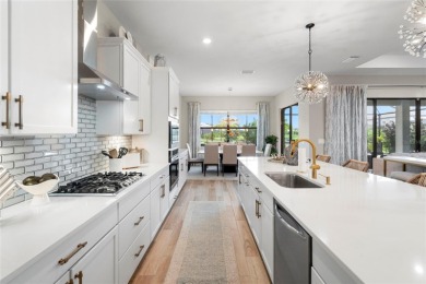 Under contract-accepting backup offers. 4813 Sparkling Sea Lane on Esplanade Golf and Country at Lakewood Ranch in Florida - for sale on GolfHomes.com, golf home, golf lot