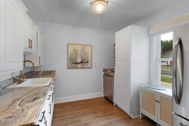 This updated, fully furnished 3-bedroom, 2-bath home in Beaufort on North River Club in North Carolina - for sale on GolfHomes.com, golf home, golf lot