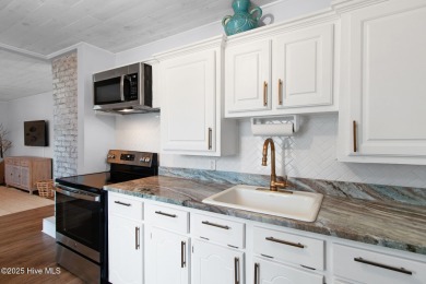 This updated, fully furnished 3-bedroom, 2-bath home in Beaufort on North River Club in North Carolina - for sale on GolfHomes.com, golf home, golf lot