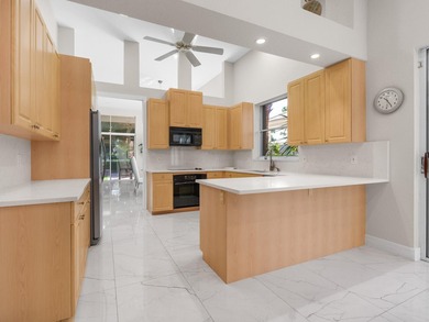 Step inside this beautifully updated home and enjoy a bright on Addison Reserve in Florida - for sale on GolfHomes.com, golf home, golf lot