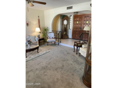 This 3 Bedroom + Den, 2 Bathroom Pool home, is perfectly located on London Bridge Golf Course in Arizona - for sale on GolfHomes.com, golf home, golf lot