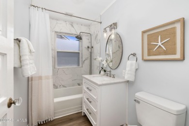 This updated, fully furnished 3-bedroom, 2-bath home in Beaufort on North River Club in North Carolina - for sale on GolfHomes.com, golf home, golf lot