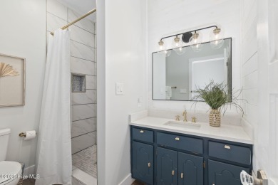 This updated, fully furnished 3-bedroom, 2-bath home in Beaufort on North River Club in North Carolina - for sale on GolfHomes.com, golf home, golf lot