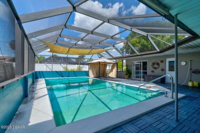 WOW FACTOR is on prominent display throughout this fantastic on Daytona Beach Golf Club in Florida - for sale on GolfHomes.com, golf home, golf lot