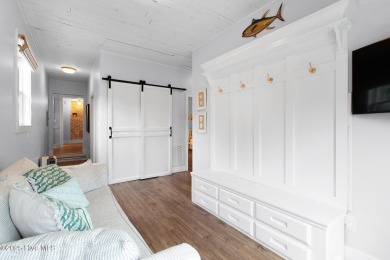 This updated, fully furnished 3-bedroom, 2-bath home in Beaufort on North River Club in North Carolina - for sale on GolfHomes.com, golf home, golf lot