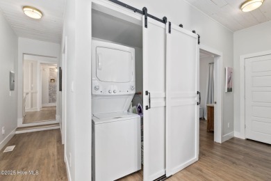 This updated, fully furnished 3-bedroom, 2-bath home in Beaufort on North River Club in North Carolina - for sale on GolfHomes.com, golf home, golf lot