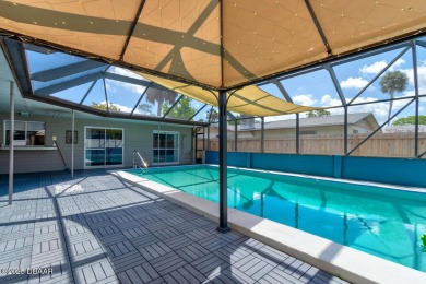 WOW FACTOR is on prominent display throughout this fantastic on Daytona Beach Golf Club in Florida - for sale on GolfHomes.com, golf home, golf lot