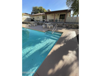 This 3 Bedroom + Den, 2 Bathroom Pool home, is perfectly located on London Bridge Golf Course in Arizona - for sale on GolfHomes.com, golf home, golf lot