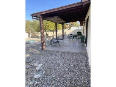 This 3 Bedroom + Den, 2 Bathroom Pool home, is perfectly located on London Bridge Golf Course in Arizona - for sale on GolfHomes.com, golf home, golf lot