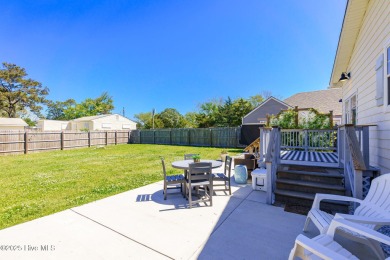 This updated, fully furnished 3-bedroom, 2-bath home in Beaufort on North River Club in North Carolina - for sale on GolfHomes.com, golf home, golf lot