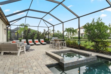 Under contract-accepting backup offers. 4813 Sparkling Sea Lane on Esplanade Golf and Country at Lakewood Ranch in Florida - for sale on GolfHomes.com, golf home, golf lot