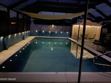WOW FACTOR is on prominent display throughout this fantastic on Daytona Beach Golf Club in Florida - for sale on GolfHomes.com, golf home, golf lot