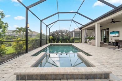 Under contract-accepting backup offers. 4813 Sparkling Sea Lane on Esplanade Golf and Country at Lakewood Ranch in Florida - for sale on GolfHomes.com, golf home, golf lot