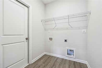 Beautifully designed 5-bedroom, 4.5-bath home in the on Mirror Lake Golf Club in Georgia - for sale on GolfHomes.com, golf home, golf lot