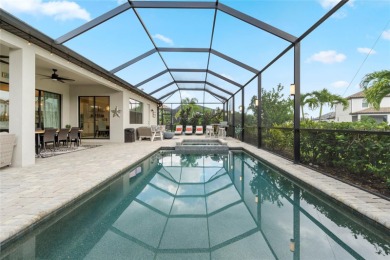 Under contract-accepting backup offers. 4813 Sparkling Sea Lane on Esplanade Golf and Country at Lakewood Ranch in Florida - for sale on GolfHomes.com, golf home, golf lot