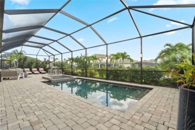 Under contract-accepting backup offers. 4813 Sparkling Sea Lane on Esplanade Golf and Country at Lakewood Ranch in Florida - for sale on GolfHomes.com, golf home, golf lot