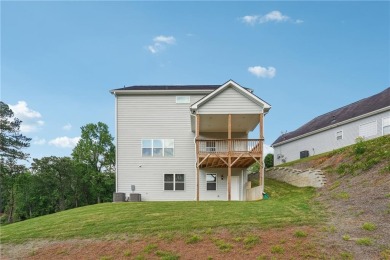 Beautifully designed 5-bedroom, 4.5-bath home in the on Mirror Lake Golf Club in Georgia - for sale on GolfHomes.com, golf home, golf lot
