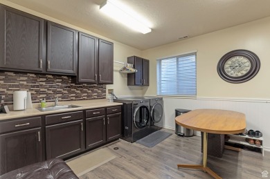 This beautiful Bountiful East Bench home has a large grassy on Eaglewood Golf Course in Utah - for sale on GolfHomes.com, golf home, golf lot
