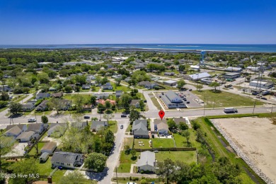 This updated, fully furnished 3-bedroom, 2-bath home in Beaufort on North River Club in North Carolina - for sale on GolfHomes.com, golf home, golf lot