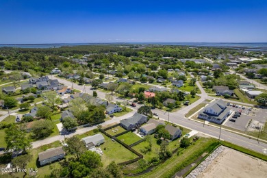 This updated, fully furnished 3-bedroom, 2-bath home in Beaufort on North River Club in North Carolina - for sale on GolfHomes.com, golf home, golf lot