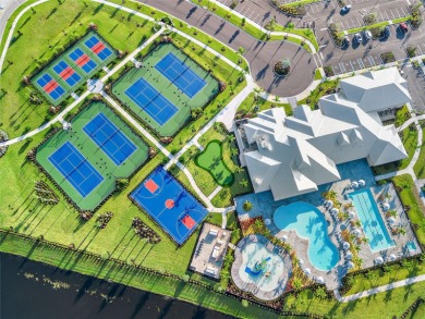 Under contract-accepting backup offers. 4813 Sparkling Sea Lane on Esplanade Golf and Country at Lakewood Ranch in Florida - for sale on GolfHomes.com, golf home, golf lot