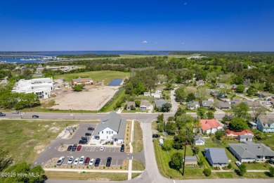 This updated, fully furnished 3-bedroom, 2-bath home in Beaufort on North River Club in North Carolina - for sale on GolfHomes.com, golf home, golf lot