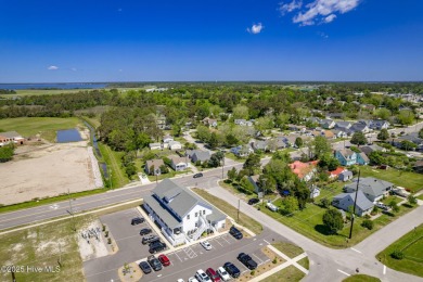 This updated, fully furnished 3-bedroom, 2-bath home in Beaufort on North River Club in North Carolina - for sale on GolfHomes.com, golf home, golf lot