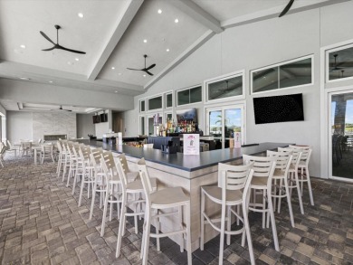 Under contract-accepting backup offers. 4813 Sparkling Sea Lane on Esplanade Golf and Country at Lakewood Ranch in Florida - for sale on GolfHomes.com, golf home, golf lot