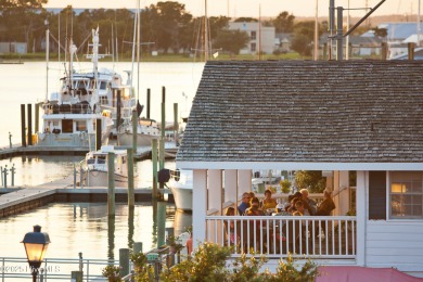 This updated, fully furnished 3-bedroom, 2-bath home in Beaufort on North River Club in North Carolina - for sale on GolfHomes.com, golf home, golf lot