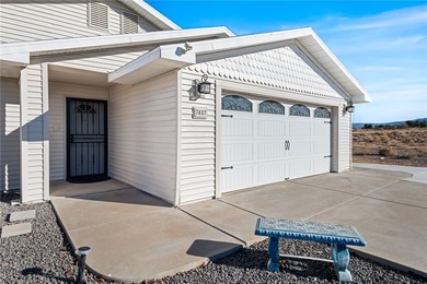 Welcome to this inviting 3-bedroom, 2-bath home located in the on Valle Vista Golf Course in Arizona - for sale on GolfHomes.com, golf home, golf lot