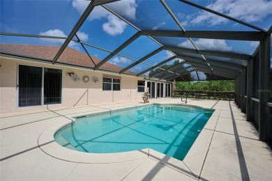 Under contract-accepting backup offers. Beautiful pool home in on Indian Lake Estates Golf and Country Club in Florida - for sale on GolfHomes.com, golf home, golf lot