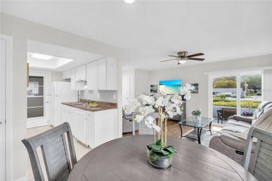 Beautifully renovated and spacious villa in Palm Harbor's on Highland Lakes Executive Golf Course in Florida - for sale on GolfHomes.com, golf home, golf lot