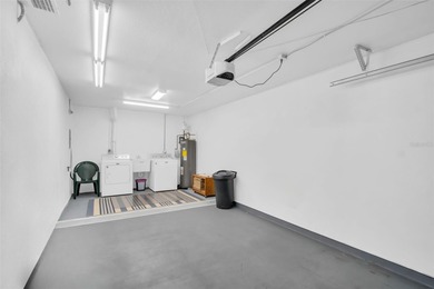 Beautifully renovated and spacious villa in Palm Harbor's on Highland Lakes Executive Golf Course in Florida - for sale on GolfHomes.com, golf home, golf lot