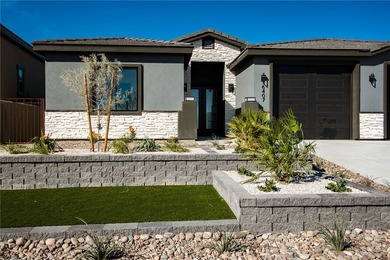 Experience modern luxury and energy-efficient living in this on Los Lagos Golf Club in Arizona - for sale on GolfHomes.com, golf home, golf lot